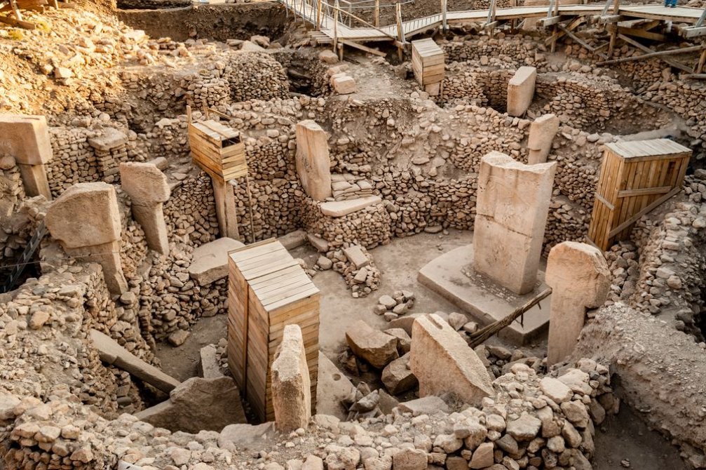 Picture showing gobekli tepe dig site from an angle from above illustrating the first findings of agriculture on the planet